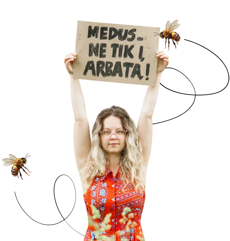 Medaus someljė Rasa Nabazaite laiko plakata su uzrasu: Medus ne tik i arbata